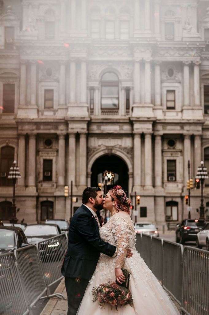 Bride and groom kissing after wedding in PA at The Mütter Museum