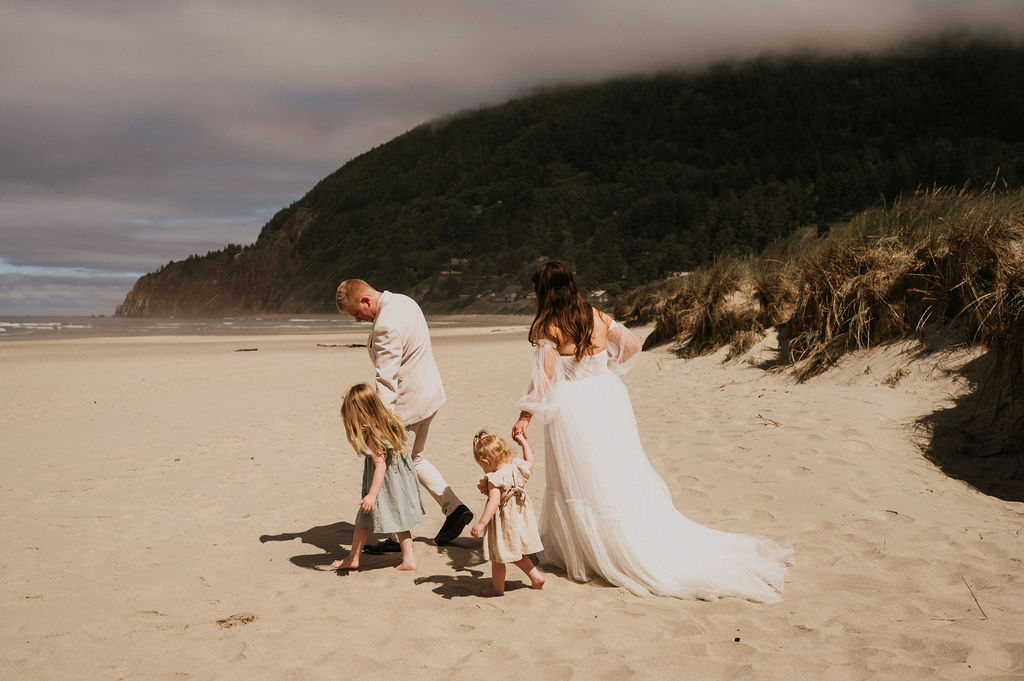 Bride and Groom having fun during their elopement with their kids.