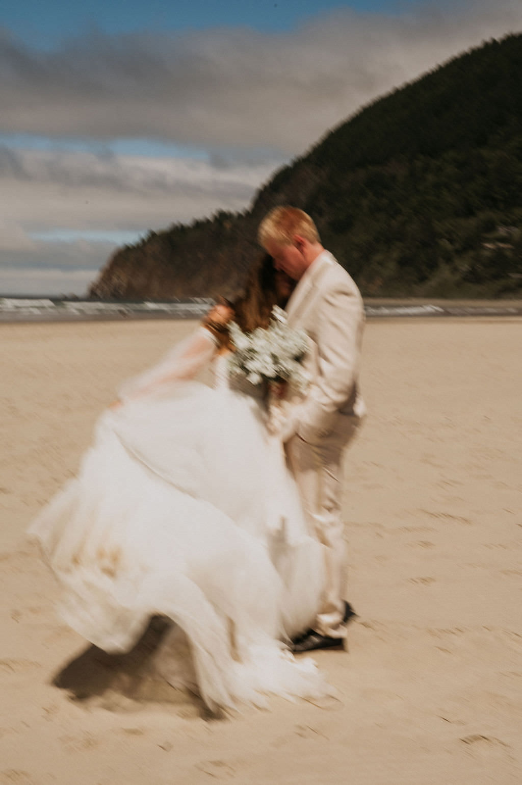 Bride and Groom during their intimate beach elopement.