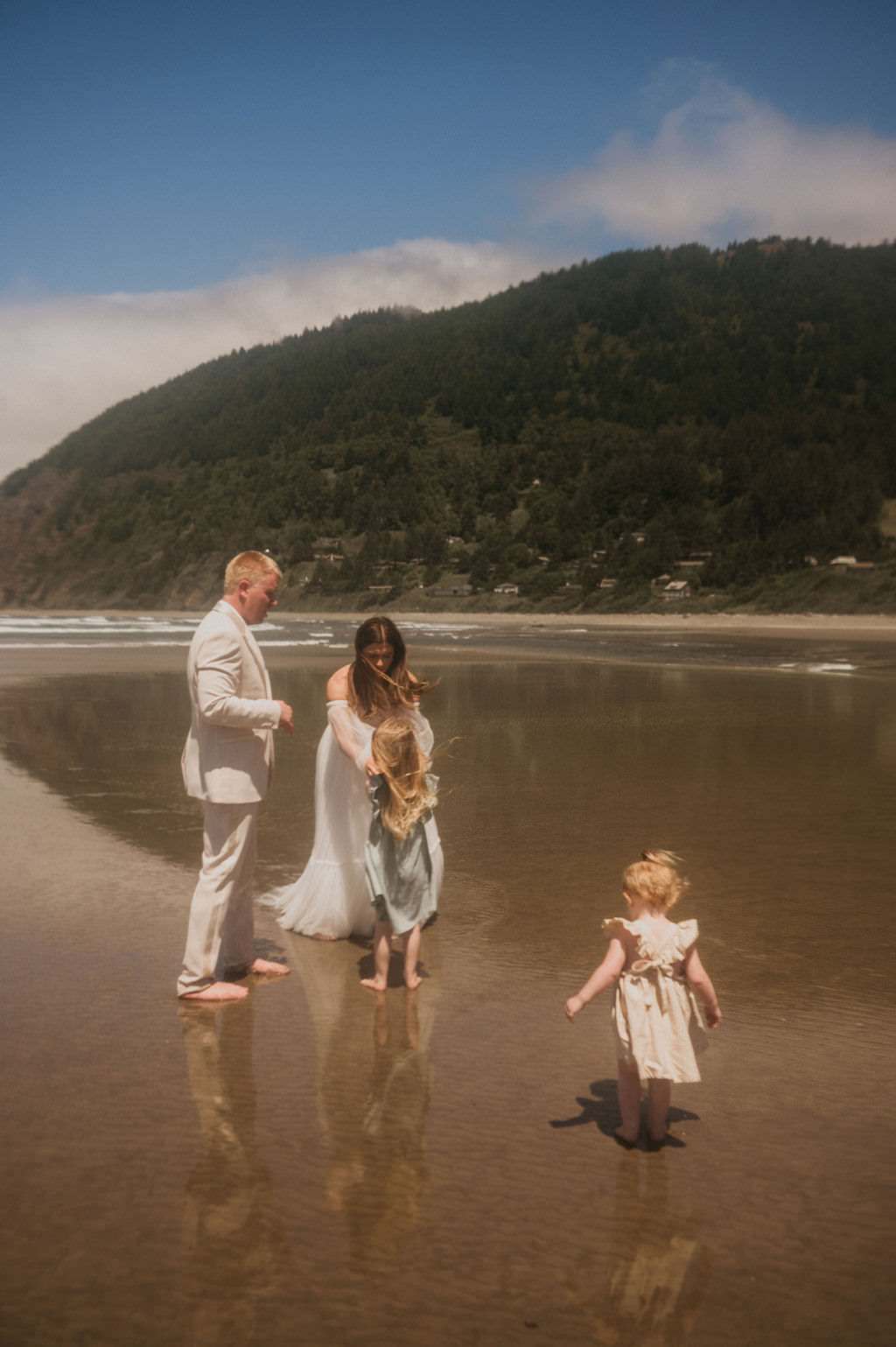 Bride and Groom with their kids at their elopement.