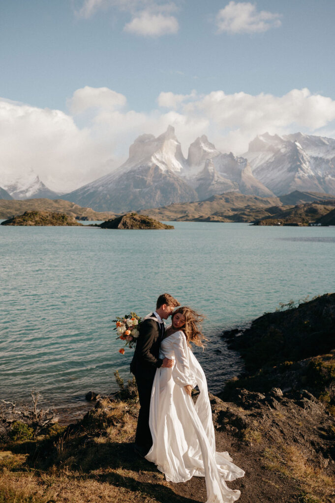 Editorial bride and groom elopement by the lake.