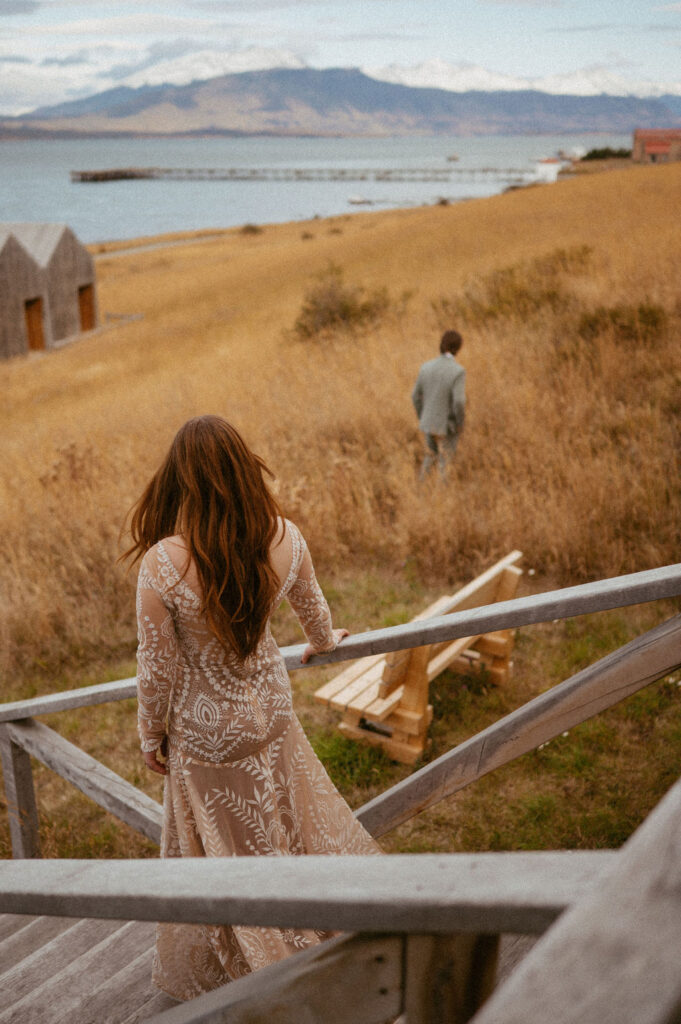 Bride walking toward her groom for their first look at their Patagonia adventure elopement.