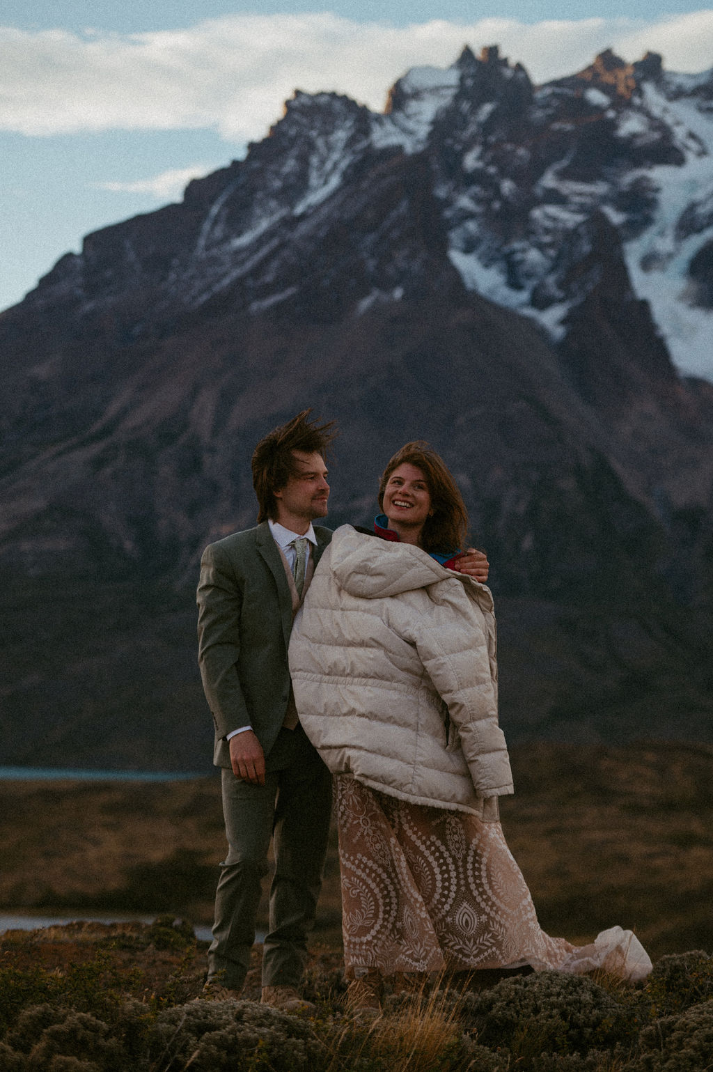 Adventurous bride and groom hiking during their Patagonia elopement.