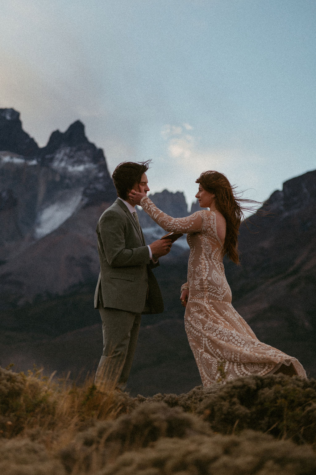 Groom reading his vows with the Patagonia mountains in the background.