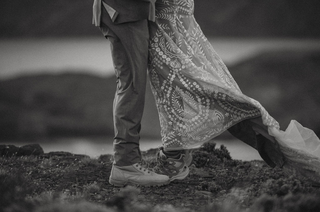 Lower halves of a couple eloping in the Patagonia mountains of Argentina.