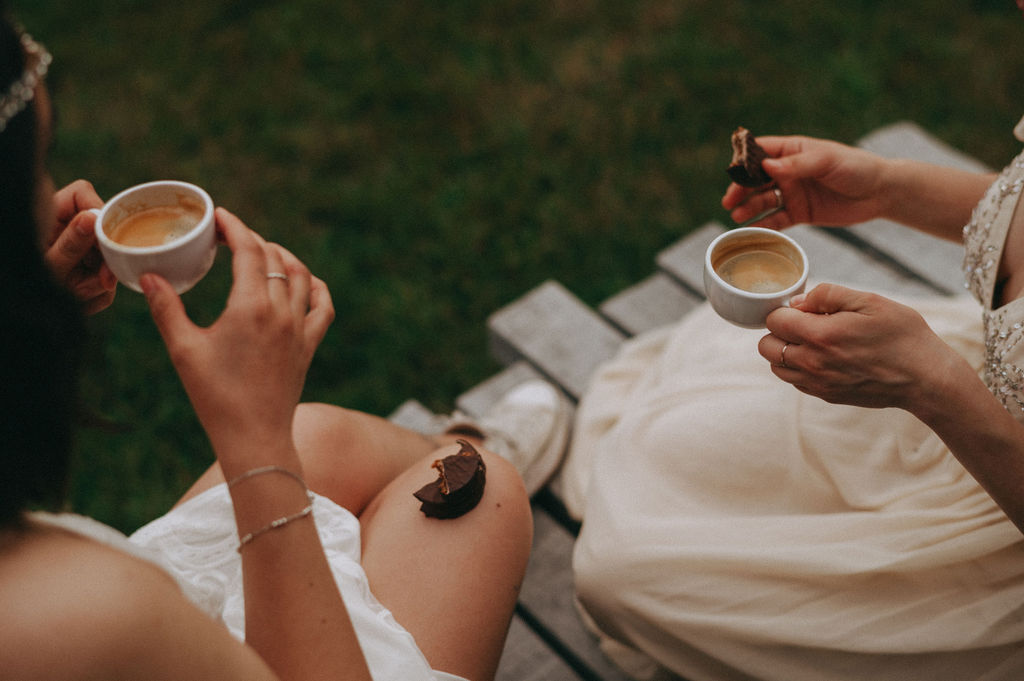 Couple sharing a coffee and Patagonian chocolate during their intimate wedding in Argentina.