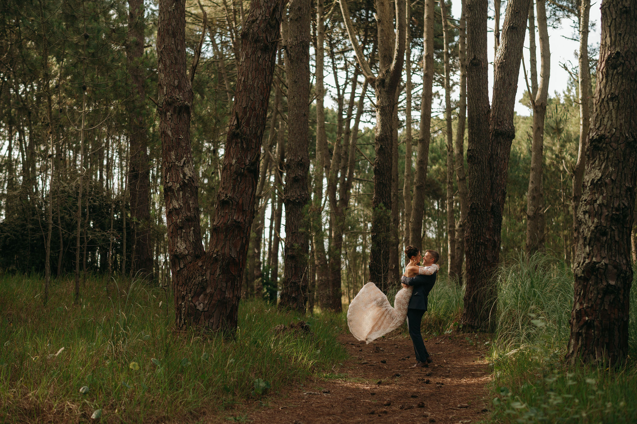 Candid elopement photography in the woods.