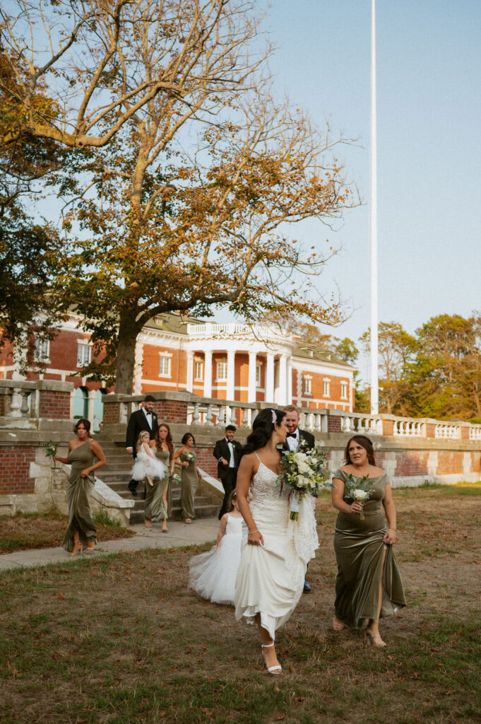 Bride and wedding party walking towards their traditional ceremony.